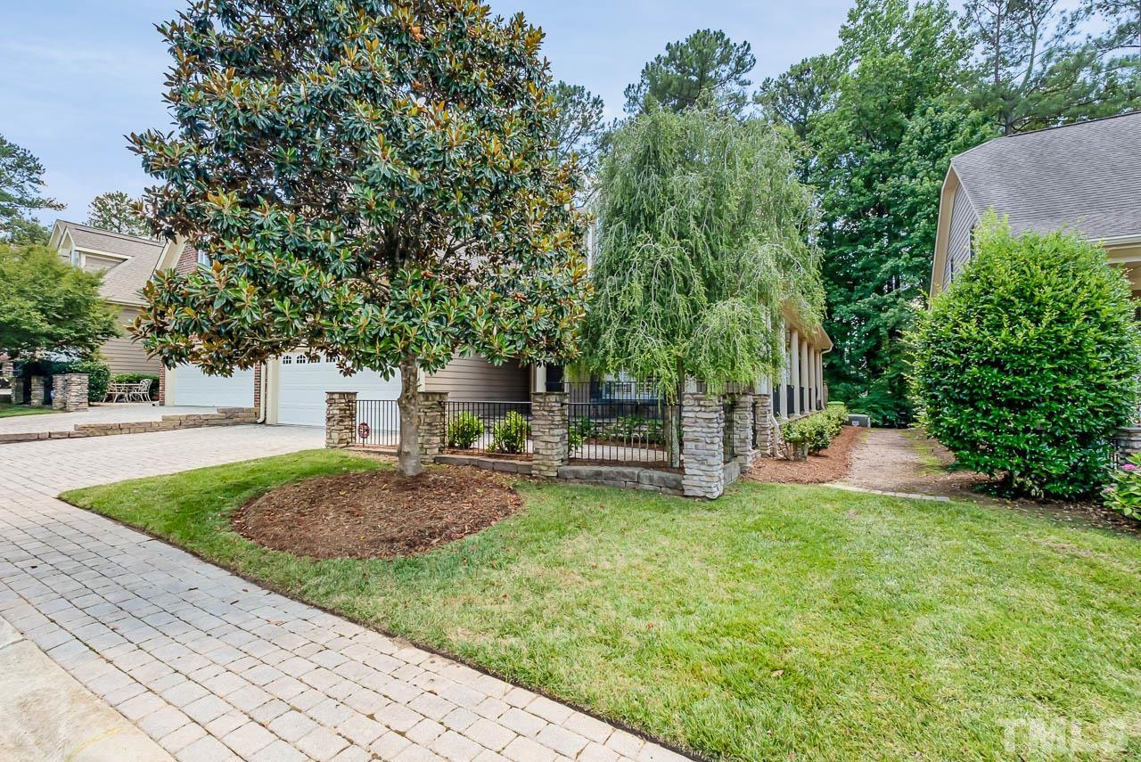 109 Nouveau Avenue Raleigh, NC 27615 - Photo 29 of 29 a view of a backyard with sitting area