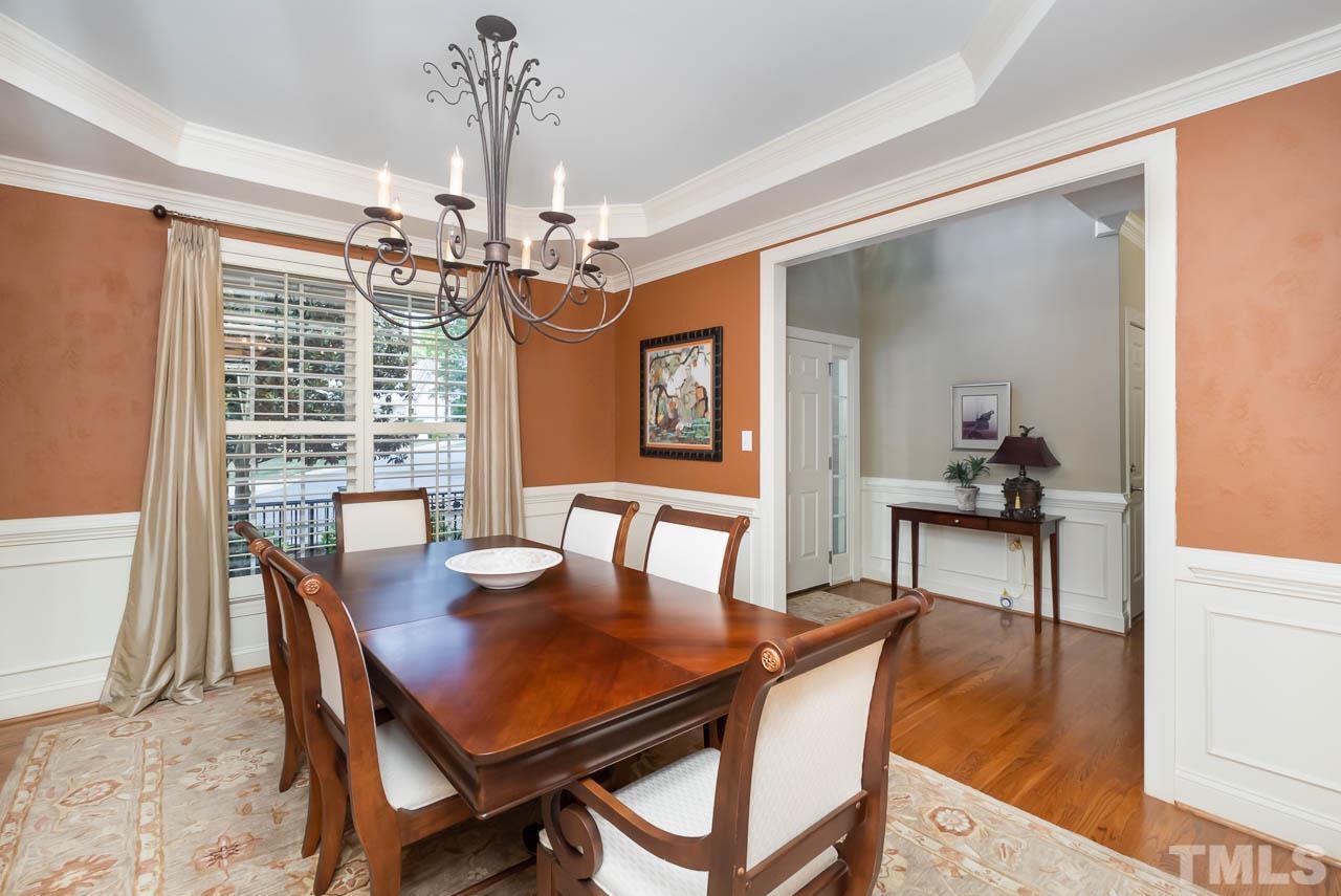 109 Nouveau Avenue Raleigh, NC 27615 - Photo 9 of 29 a view of a dining room with furniture window and wooden floor