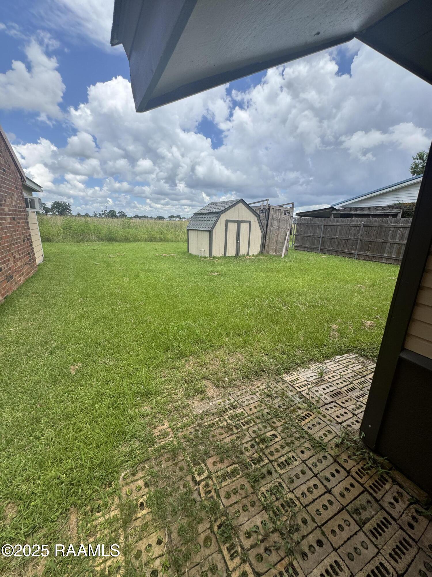 209 Lowell Drive Lafayette, LA 70506 - Photo 11 of 12 Open Back Yard