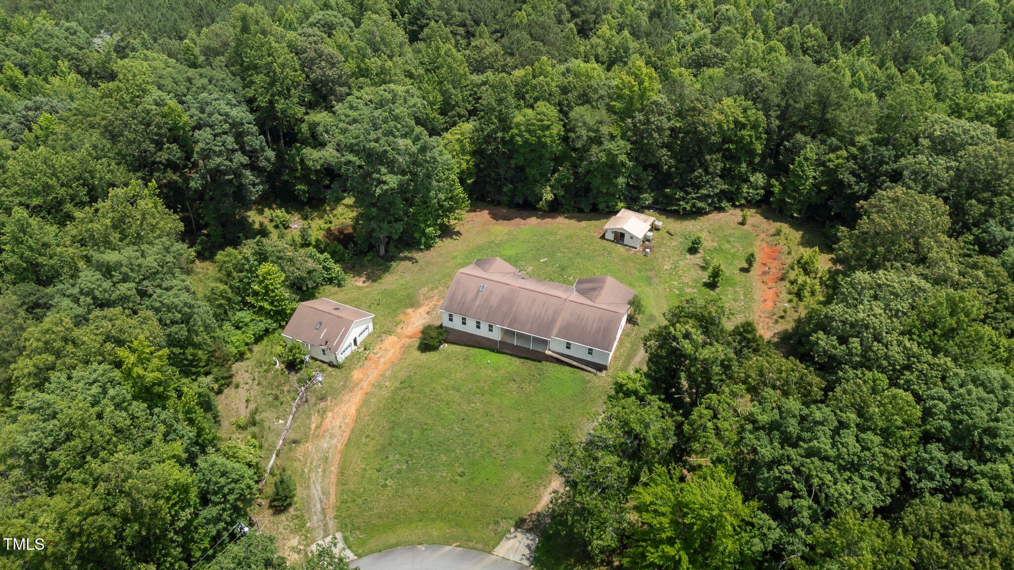 129 Shaman Drive Spring Hope, NC 27882 - Photo 12 of 33 an aerial view of a house with a yard