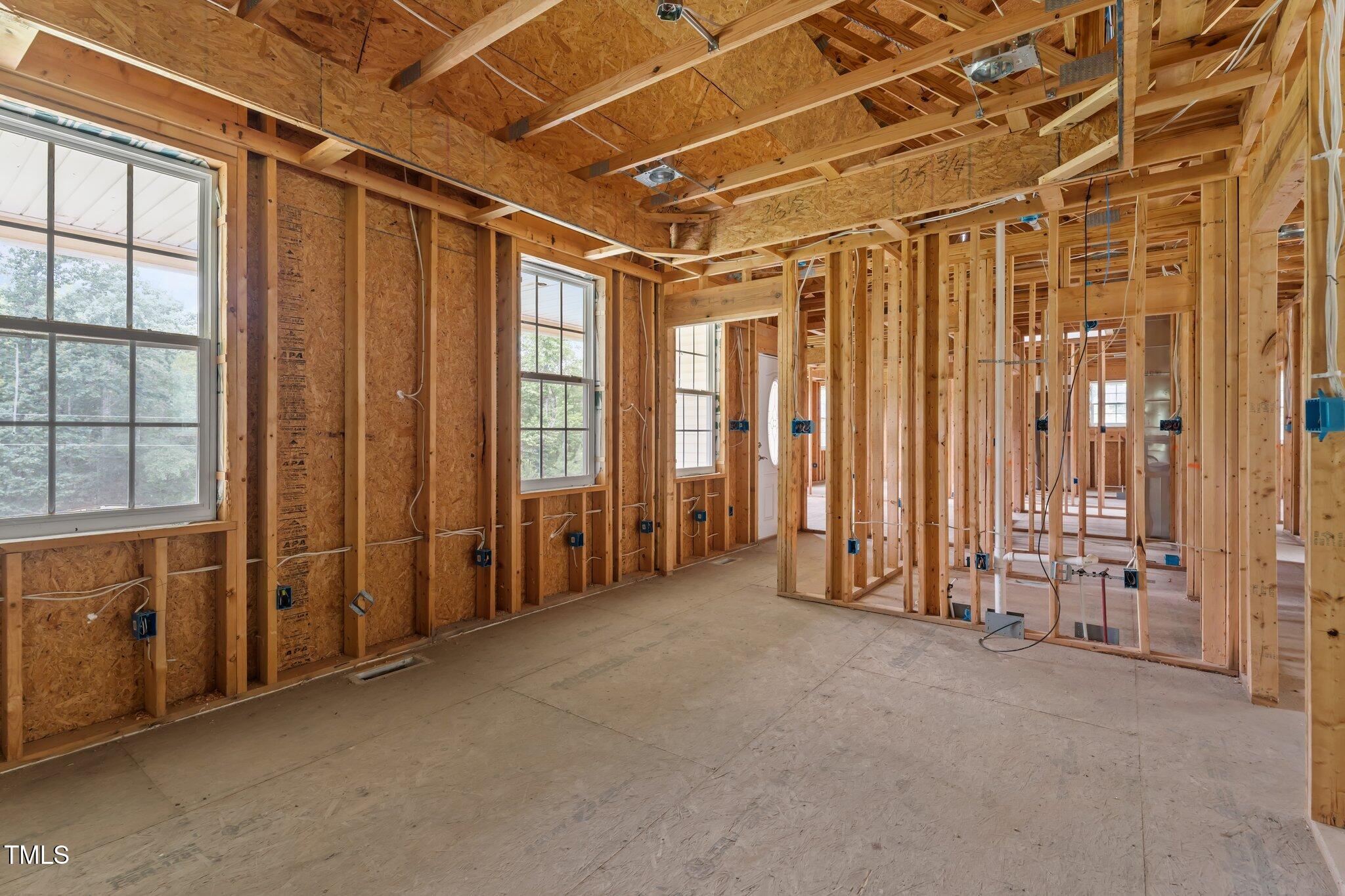 129 Shaman Drive Spring Hope, NC 27882 - Photo 17 of 33 a view of an empty room with a window