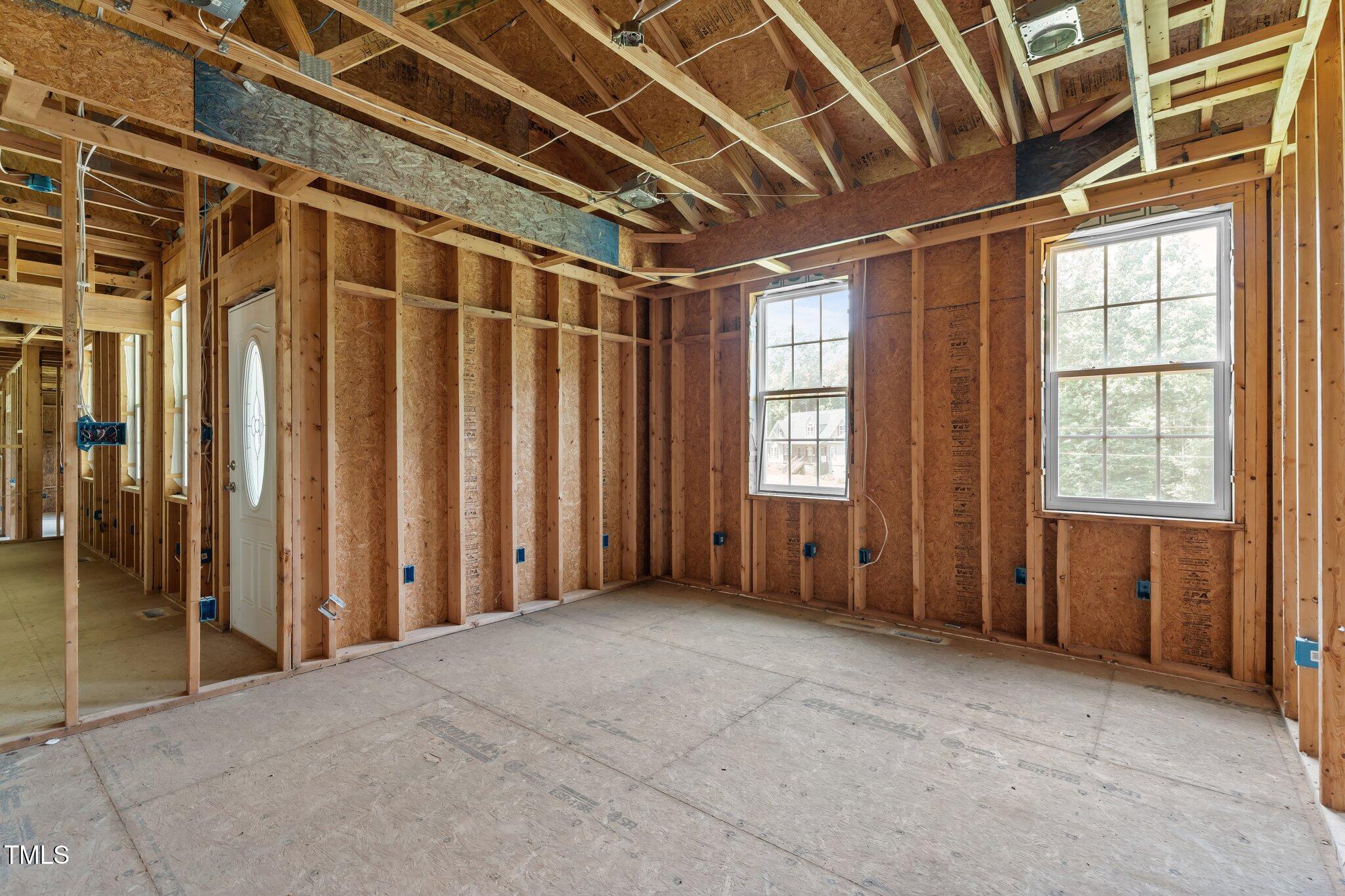 129 Shaman Drive Spring Hope, NC 27882 - Photo 21 of 33 a view of an empty room with a window