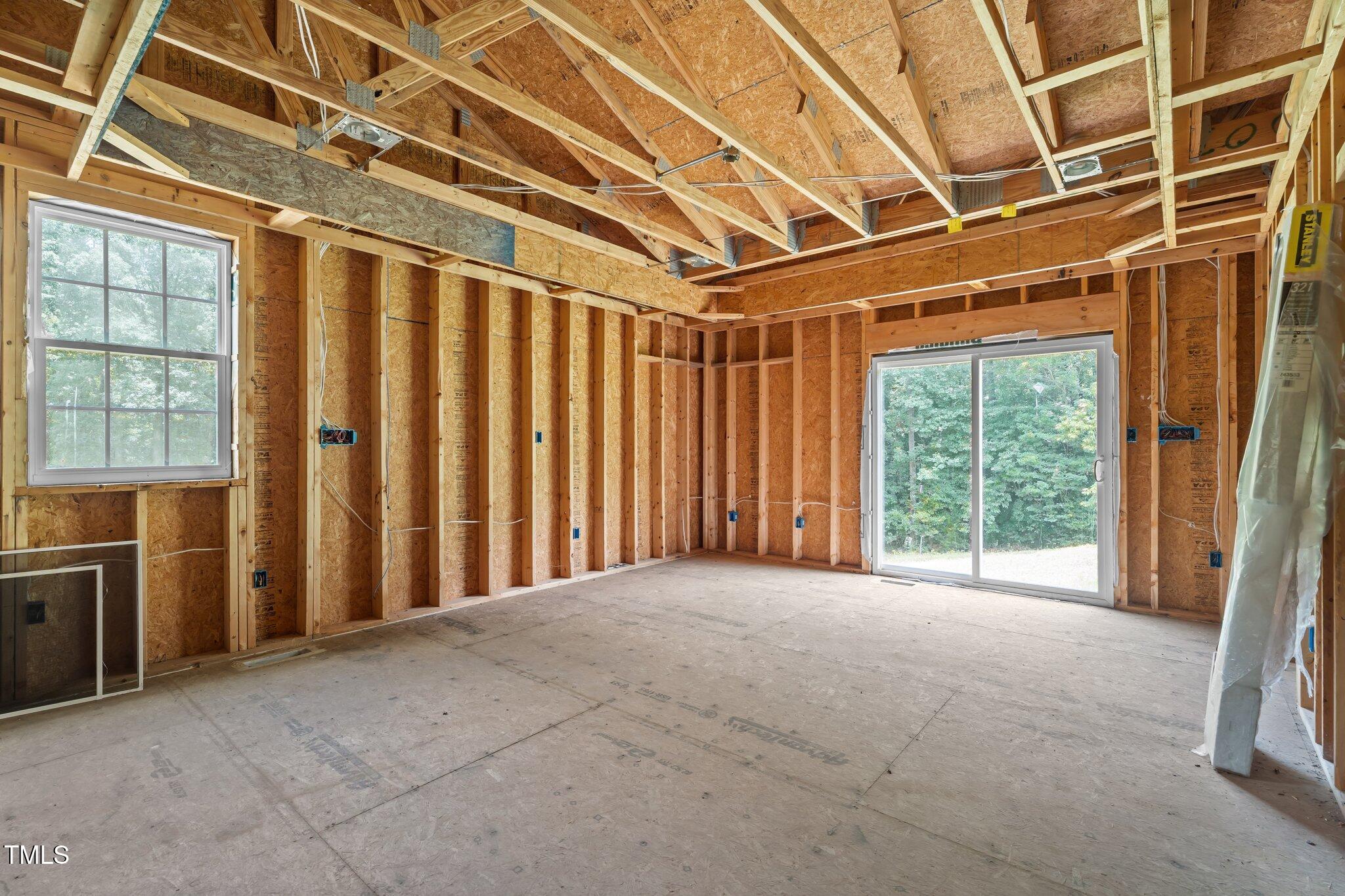 129 Shaman Drive Spring Hope, NC 27882 - Photo 25 of 33 a view of an empty room with a balcony