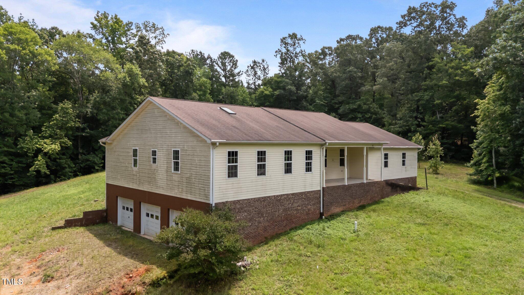 129 Shaman Drive Spring Hope, NC 27882 - Photo 5 of 33 a aerial view of a house and garden