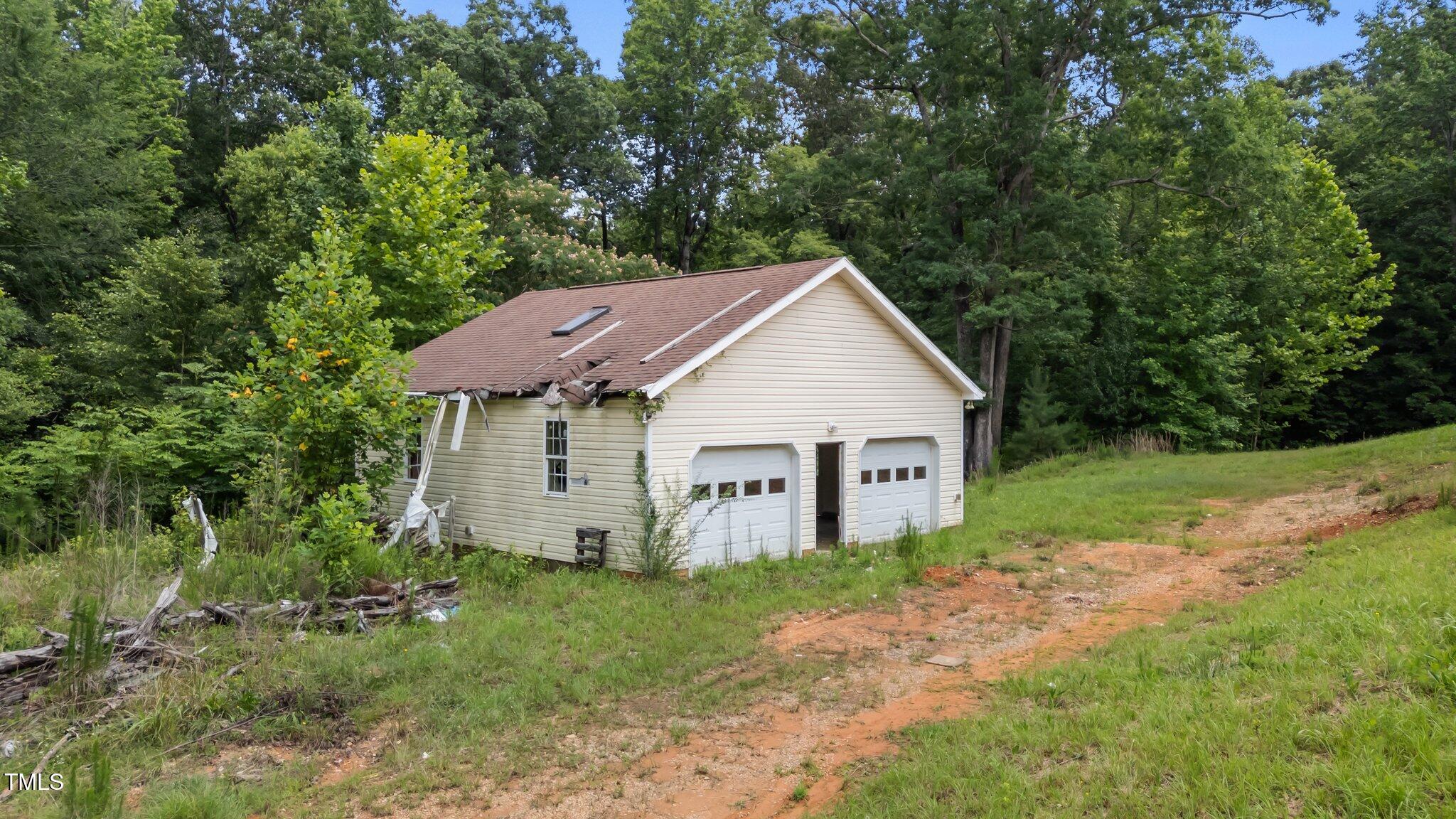 129 Shaman Drive Spring Hope, NC 27882 - Photo 9 of 33 a view of a house with backyard and garden