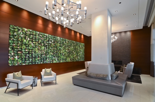 1201 South Prairie Avenue, Unit 804 Chicago, IL 60605 - Photo 3 of 13 a living room with furniture and a chandelier