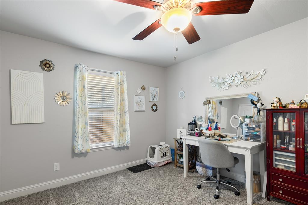 3016 Loy Lake Road Denison, TX 75020 - Photo 20 of 28 a view of a workspace with furniture and a window