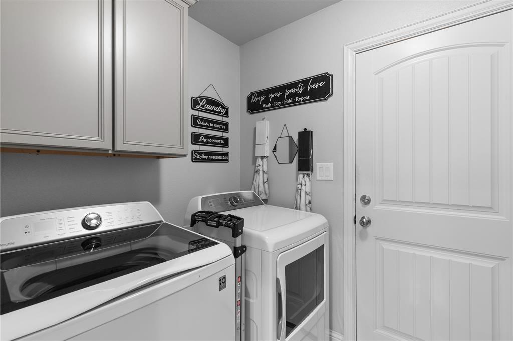 3016 Loy Lake Road Denison, TX 75020 - Photo 26 of 28 a utility room with dryer and washer