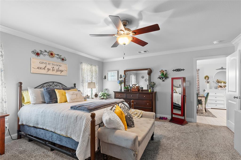 3016 Loy Lake Road Denison, TX 75020 - Photo 3 of 28 a bedroom with a bed and ceiling fan