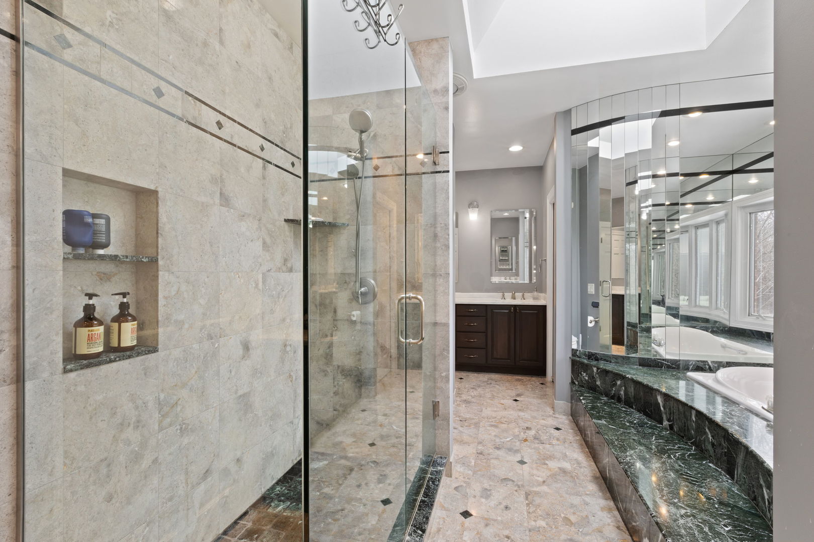 791 South Ridge Road Lake Forest, IL 60045 - Photo 19 of 40 a bathroom with a glass shower door and a sink