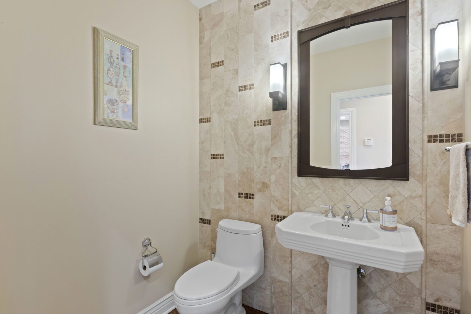791 South Ridge Road Lake Forest, IL 60045 - Photo 23 of 40 a bathroom with a toilet sink and mirror