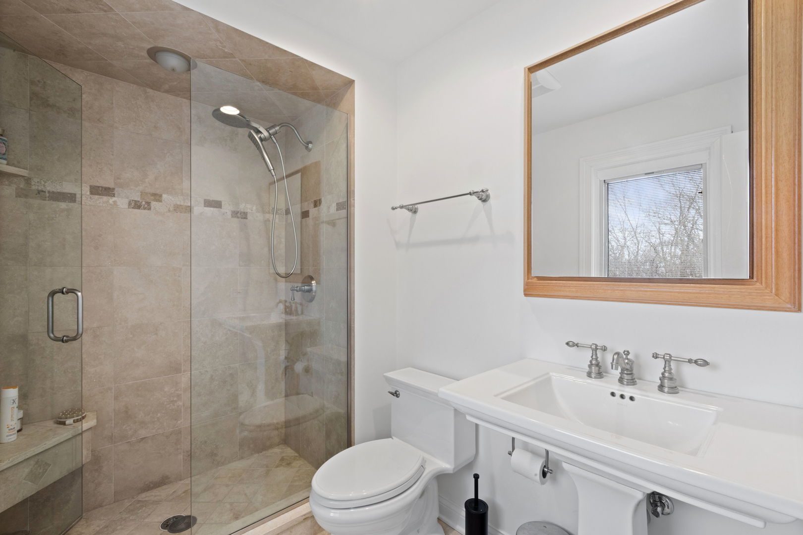791 South Ridge Road Lake Forest, IL 60045 - Photo 25 of 40 a bathroom with a sink a toilet and shower