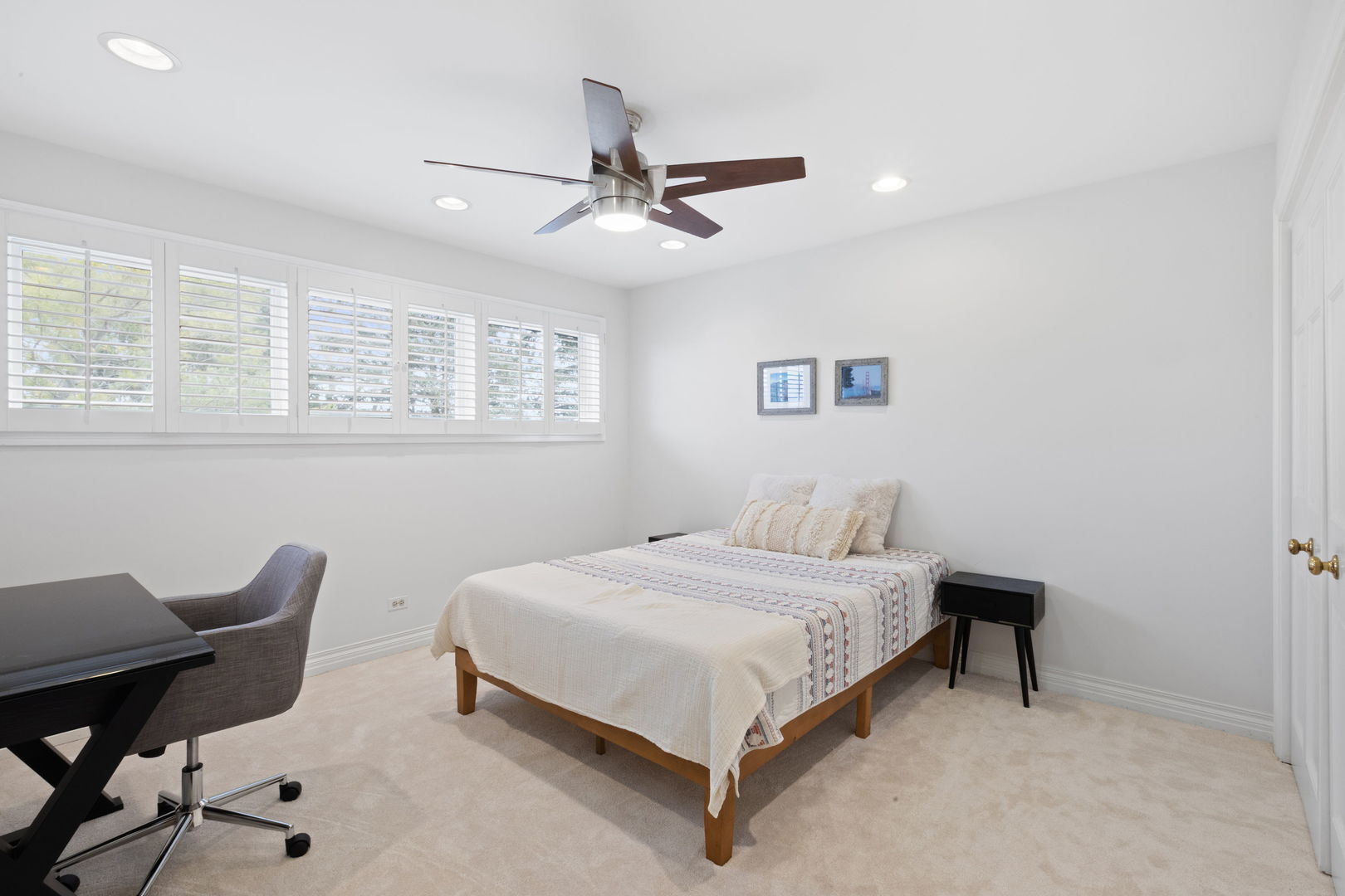 791 South Ridge Road Lake Forest, IL 60045 - Photo 26 of 40 a bedroom with a bed and chair