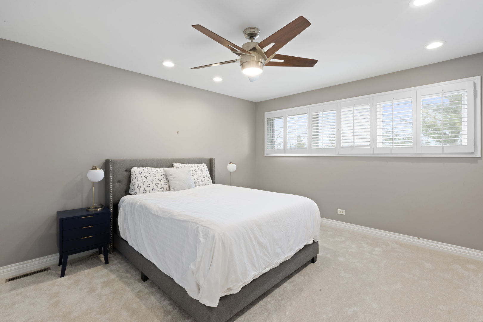 791 South Ridge Road Lake Forest, IL 60045 - Photo 28 of 40 a bedroom with a bed and window