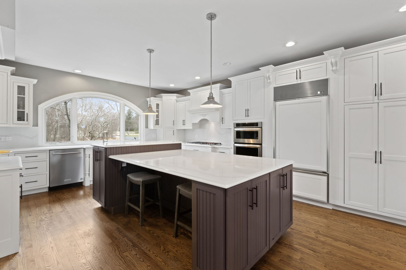 791 South Ridge Road Lake Forest, IL 60045 - Photo 10 of 40 a kitchen with kitchen island a sink stainless steel appliances and cabinets