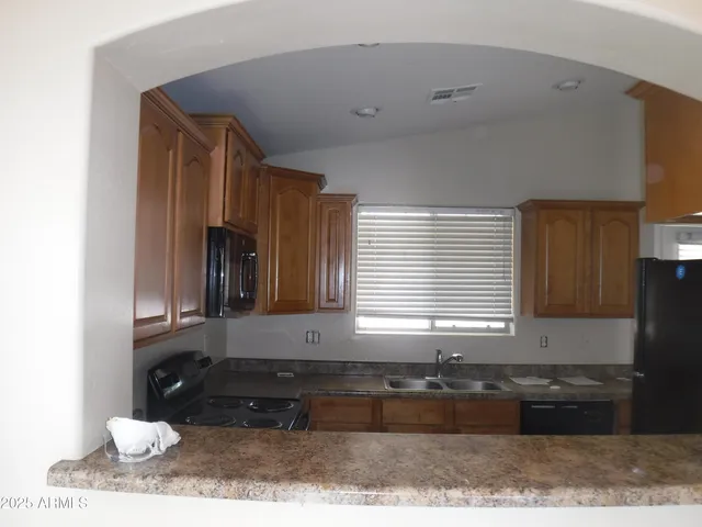 a bathroom with a bathtub and a window