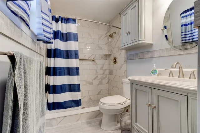 a bathroom with a sink and a toilet