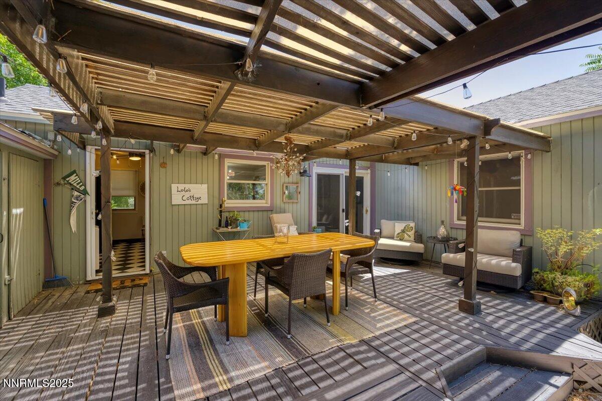 661 Thoma Street Reno, NV 89502 - Photo 19 of 33 a outdoor space with patio lots of furniture and white umbrellas