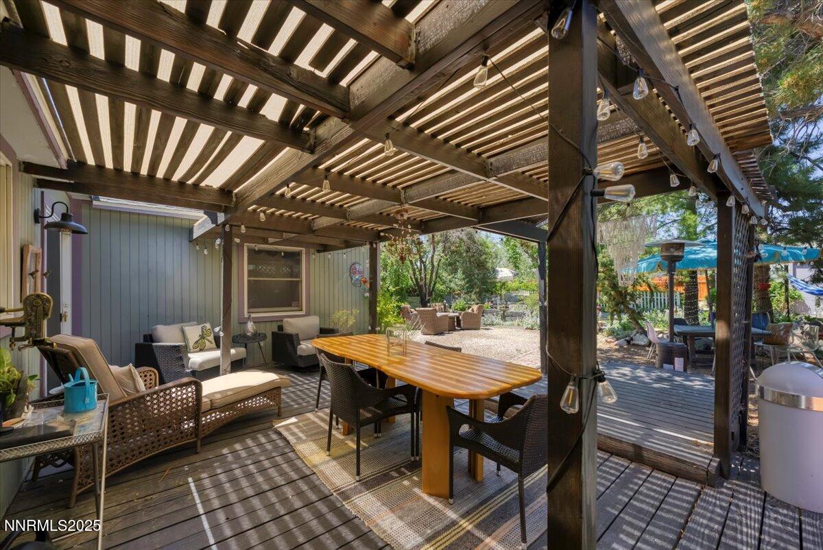 661 Thoma Street Reno, NV 89502 - Photo 21 of 33 a patio with patio outdoor seating and yard