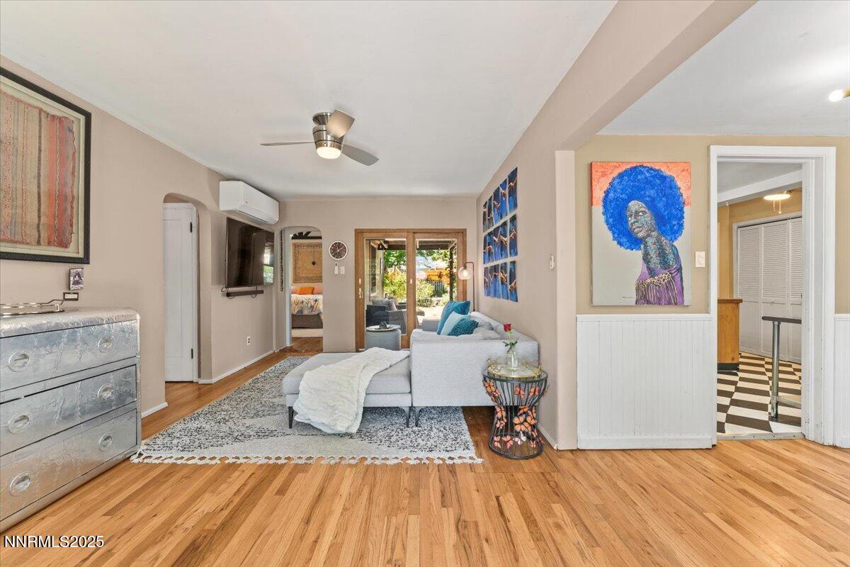 661 Thoma Street Reno, NV 89502 - Photo 3 of 33 a bedroom with a bed and wooden floor