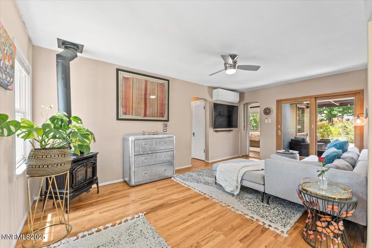 661 Thoma Street Reno, NV 89502 - Photo 4 of 33 a bedroom with furniture and a chair