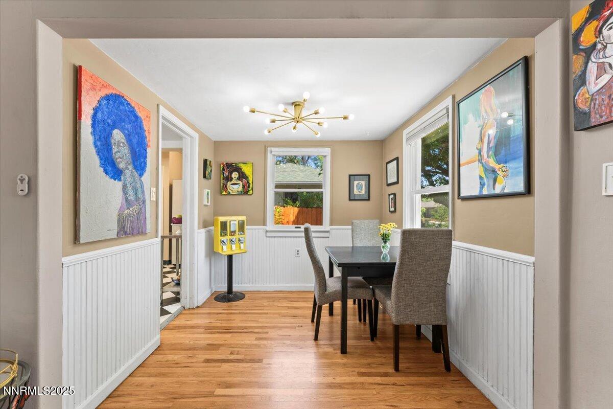 661 Thoma Street Reno, NV 89502 - Photo 8 of 33 a view of a dining room with furniture window and wooden floor
