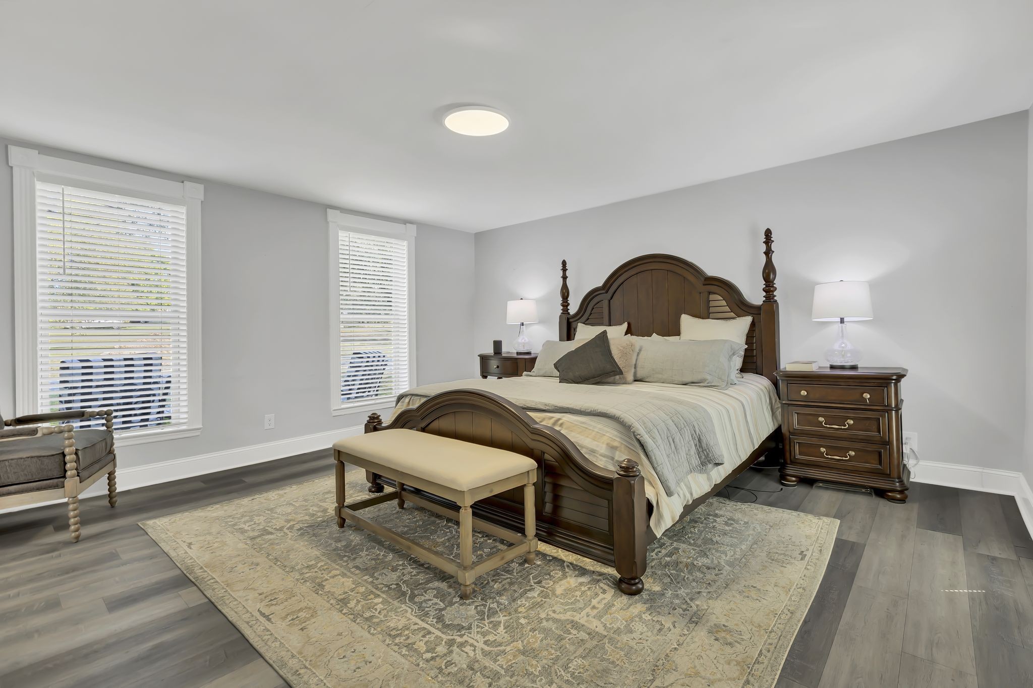 3798 McCandless Road Columbia, TN 38401 - Photo 12 of 28 a bedroom with a bed and wooden floor