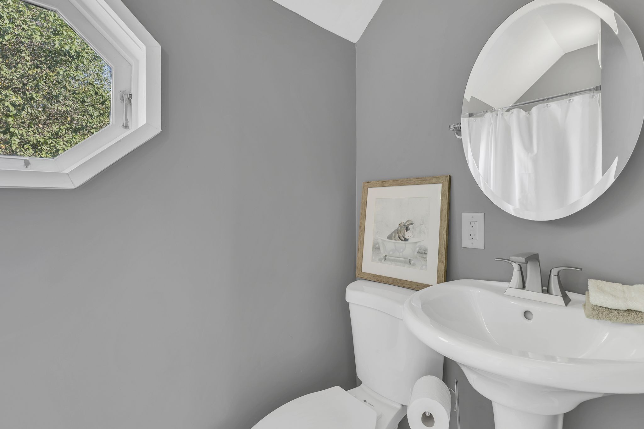 3798 McCandless Road Columbia, TN 38401 - Photo 18 of 28 a bathroom with a toilet a sink and a mirror