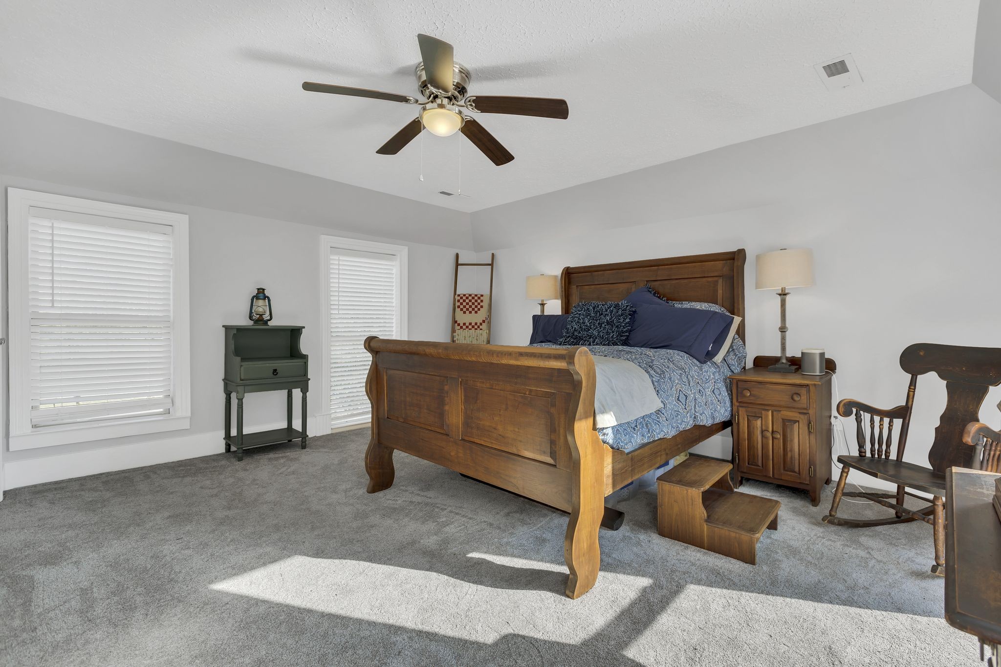 3798 McCandless Road Columbia, TN 38401 - Photo 19 of 28 a bedroom with a bed a desk and chair