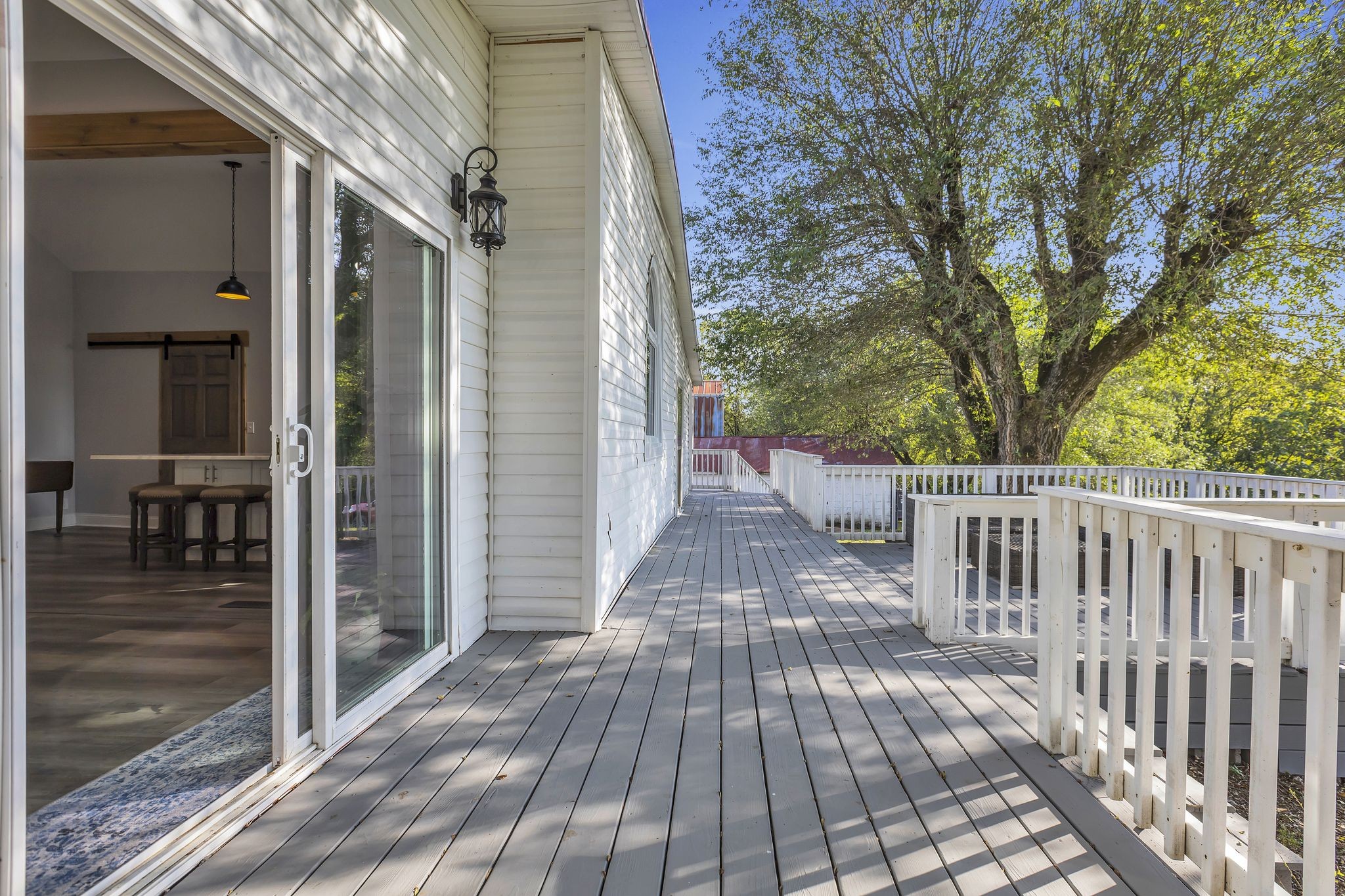 3798 McCandless Road Columbia, TN 38401 - Photo 22 of 28 a view of a balcony with wooden floor