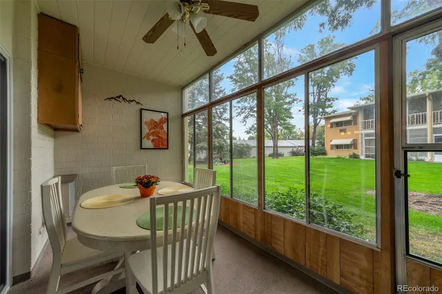 a table and chairs in a balcony