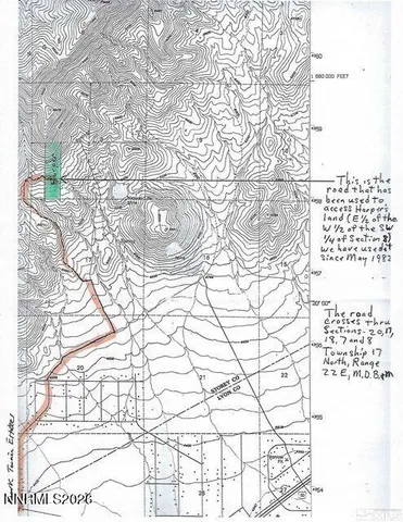 a view of a beach with a mountain view