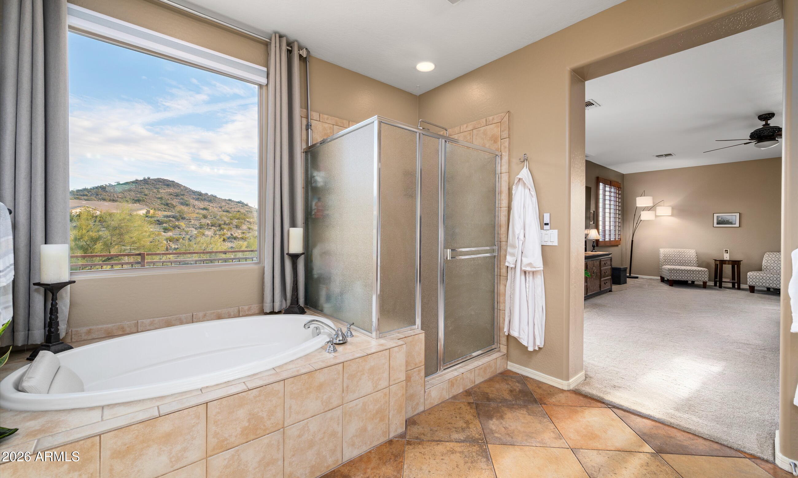 2021 West Steed Ridge Phoenix, AZ 85085 - Photo 23 of 56 a bathroom with a tub toilet and shower
