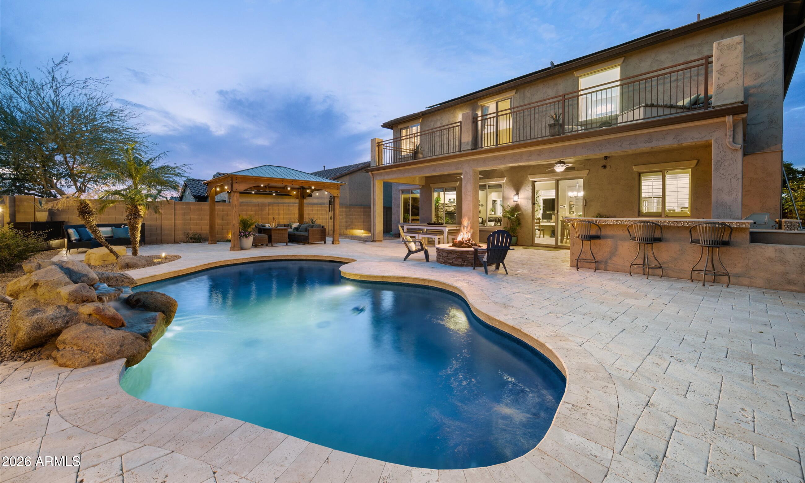 2021 West Steed Ridge Phoenix, AZ 85085 - Photo 2 of 56 a view of a swimming pool with sitting area