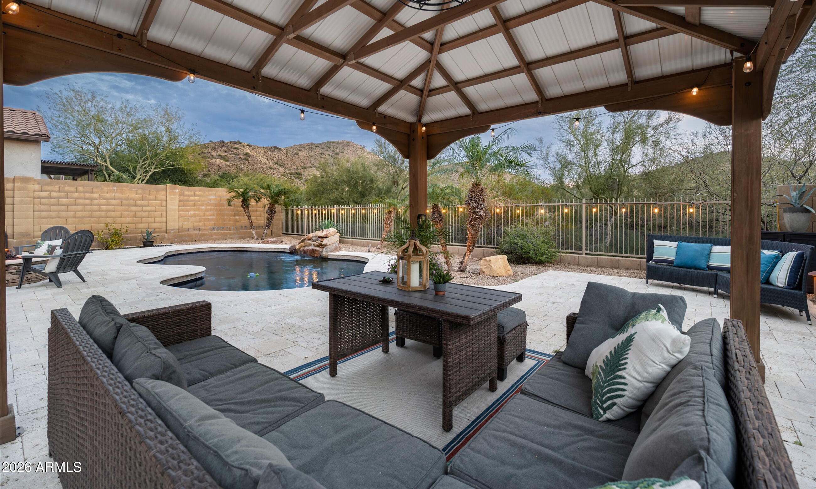 2021 West Steed Ridge Phoenix, AZ 85085 - Photo 3 of 56 a view of a patio filled with furniture