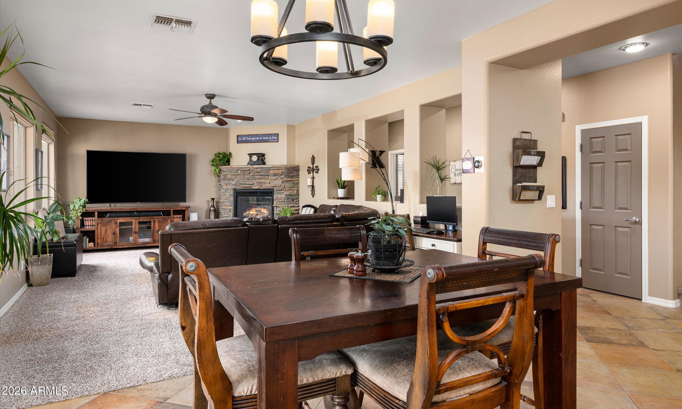 2021 West Steed Ridge Phoenix, AZ 85085 - Photo 8 of 56 a view of a dining room with furniture