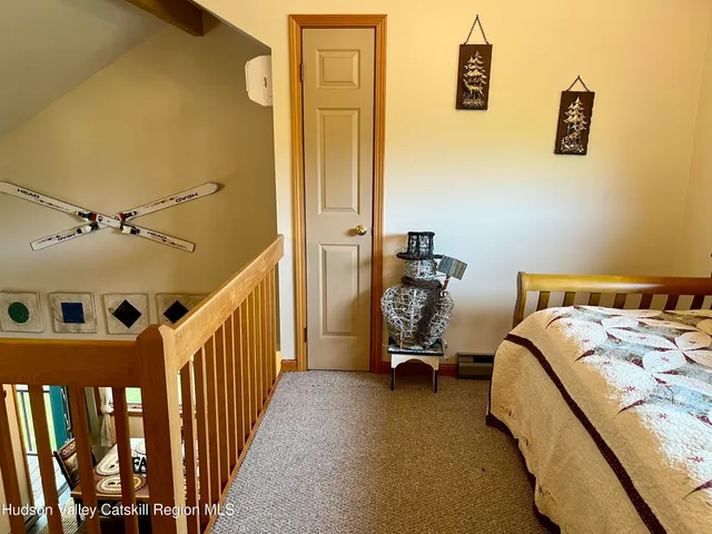 a view of swimming pool with outdoor seating and city view