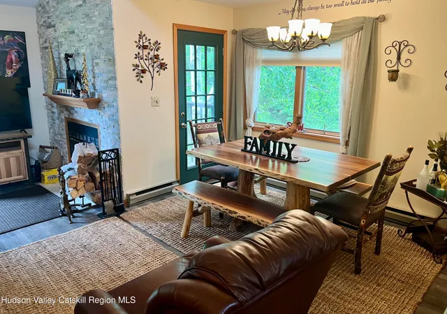 a bedroom with bed and window