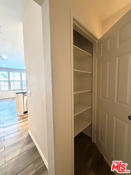 27030 Victoria Lane, Unit 76 Valencia, CA 91355 - Photo 7 of 19 a area with wooden floor