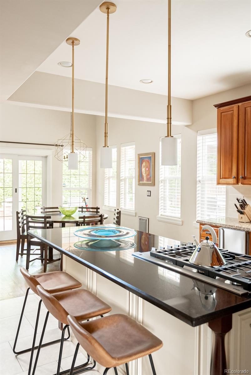 3350 Oak Street Wheat Ridge, CO 80033 - Photo 12 of 40 a kitchen with appliances a sink and cabinets