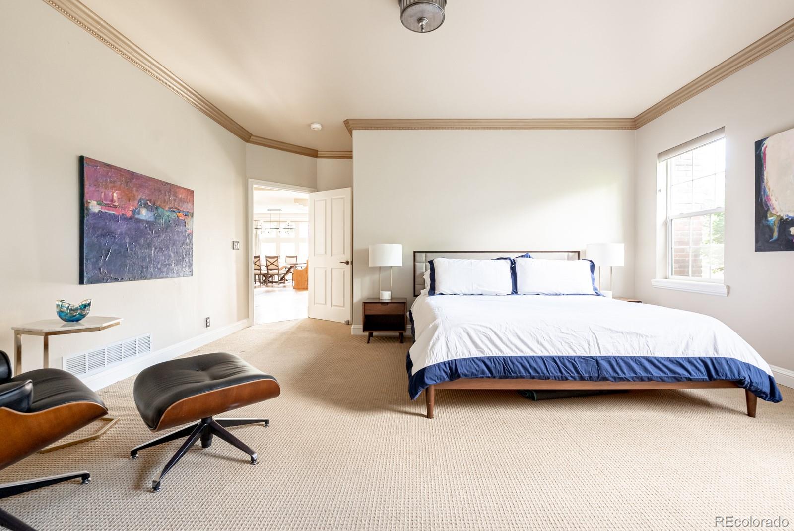 3350 Oak Street Wheat Ridge, CO 80033 - Photo 16 of 40 a bedroom with a bed chair and window