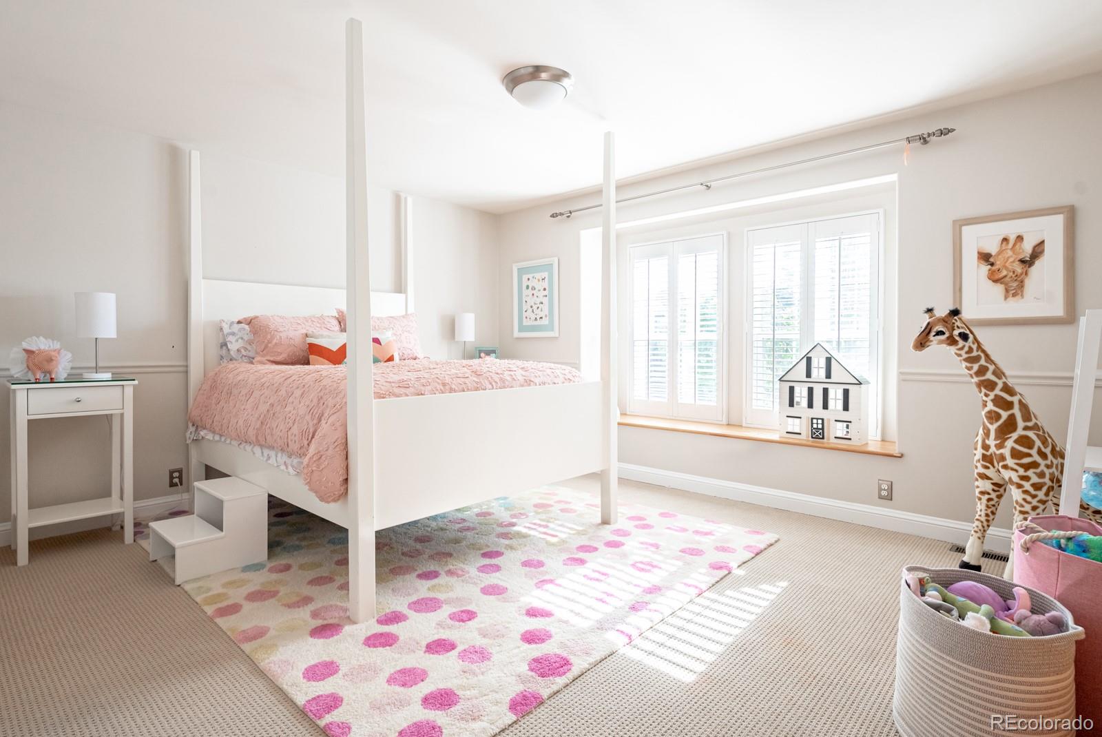 3350 Oak Street Wheat Ridge, CO 80033 - Photo 23 of 40 a bedroom with furniture and a window