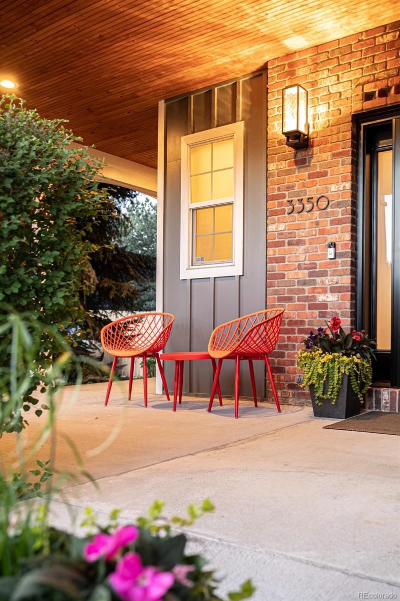 3350 Oak Street Wheat Ridge, CO 80033 - Photo 6 of 40 a building outdoor space with patio furniture and potted plants