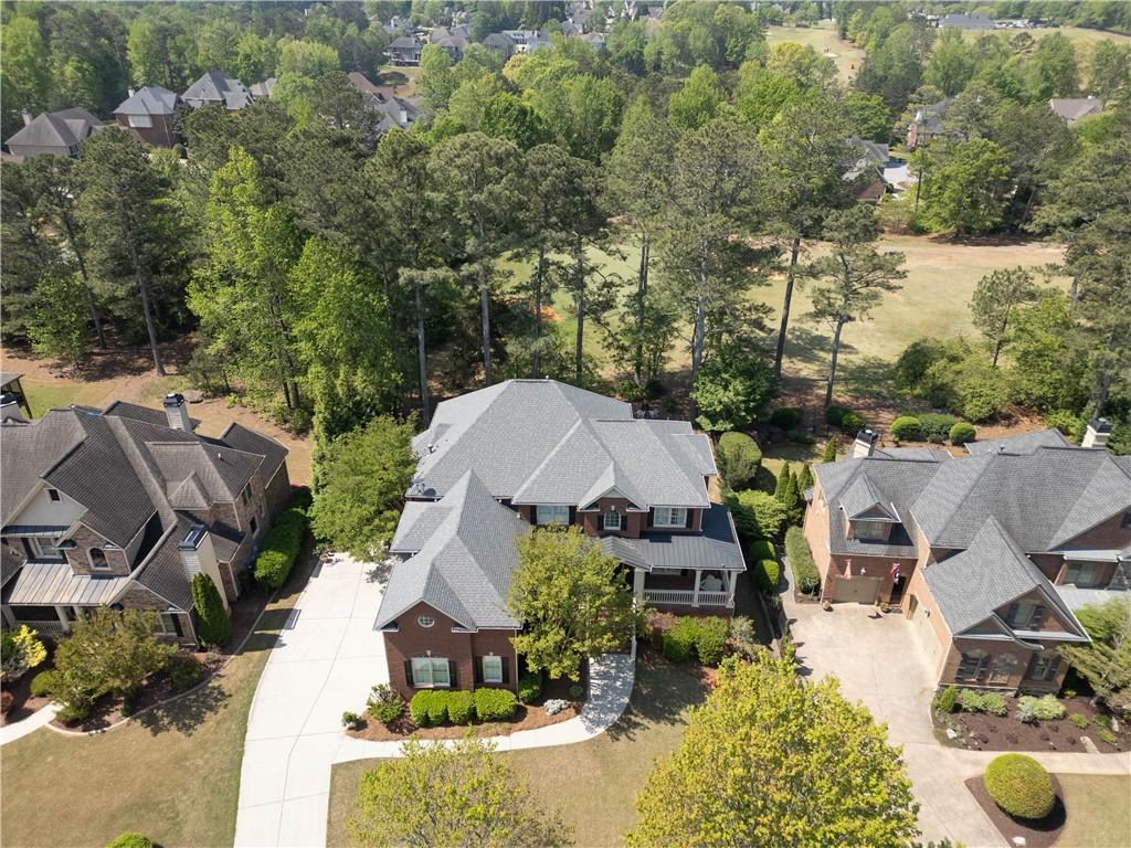 802 Pathview Court Dacula, GA 30019 - Photo 13 of 50 an aerial view of a house with yard swimming pool and outdoor seating