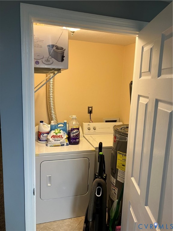 7608 Portadown Court, Unit 2602 Henrico, VA 23228 - Photo 12 of 37 a utility room with dryer washer and a view of living room