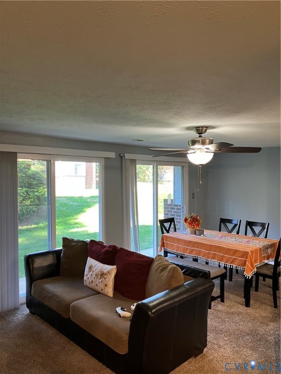 7608 Portadown Court, Unit 2602 Henrico, VA 23228 - Photo 16 of 37 a living room with furniture and a large window