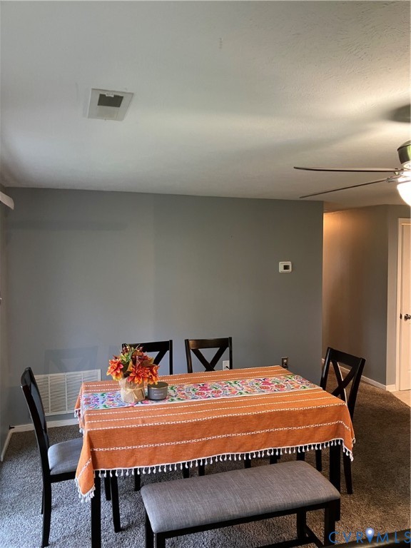 7608 Portadown Court, Unit 2602 Henrico, VA 23228 - Photo 17 of 37 a bedroom with a bed and a table in it