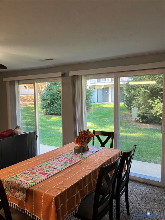 7608 Portadown Court, Unit 2602 Henrico, VA 23228 - Photo 19 of 37 a view of a dining room with furniture window and outside view