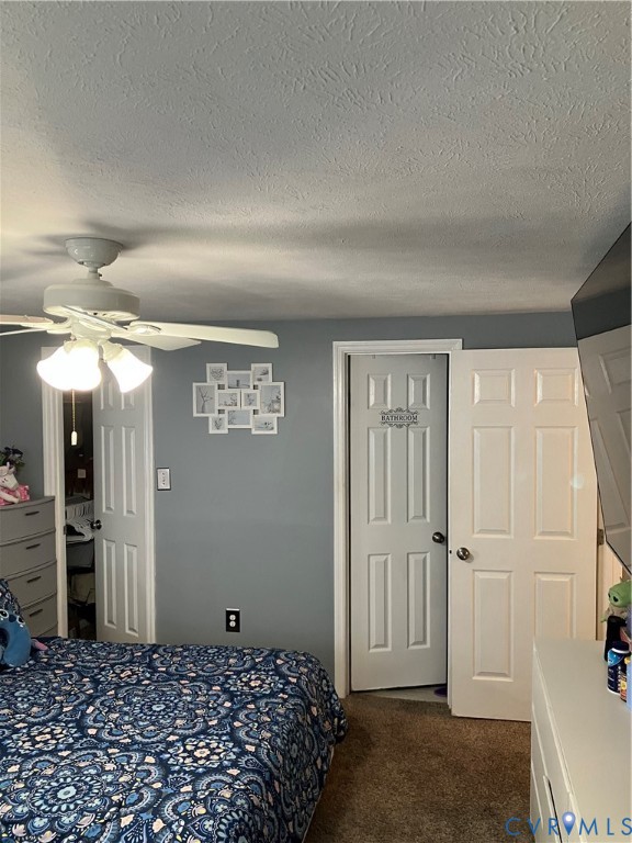 7608 Portadown Court, Unit 2602 Henrico, VA 23228 - Photo 22 of 37 a bedroom with a bed and a walk in closet