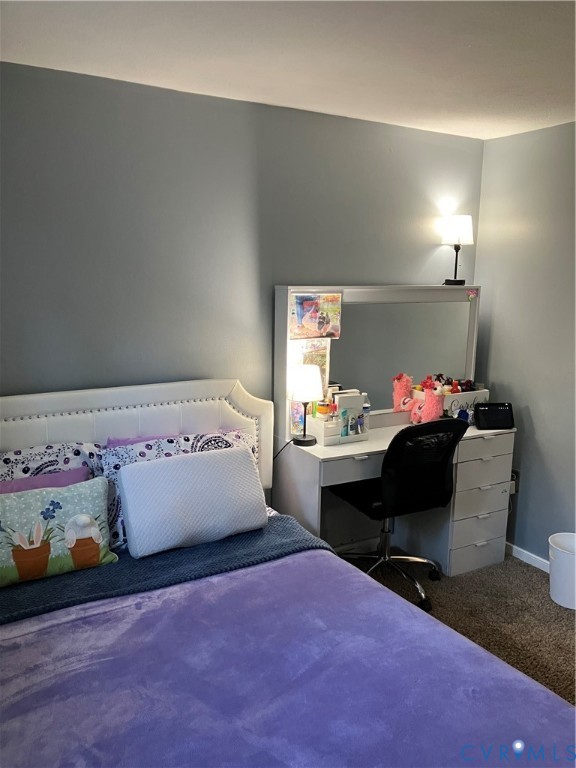 7608 Portadown Court, Unit 2602 Henrico, VA 23228 - Photo 31 of 37 a bedroom with a bed and a window